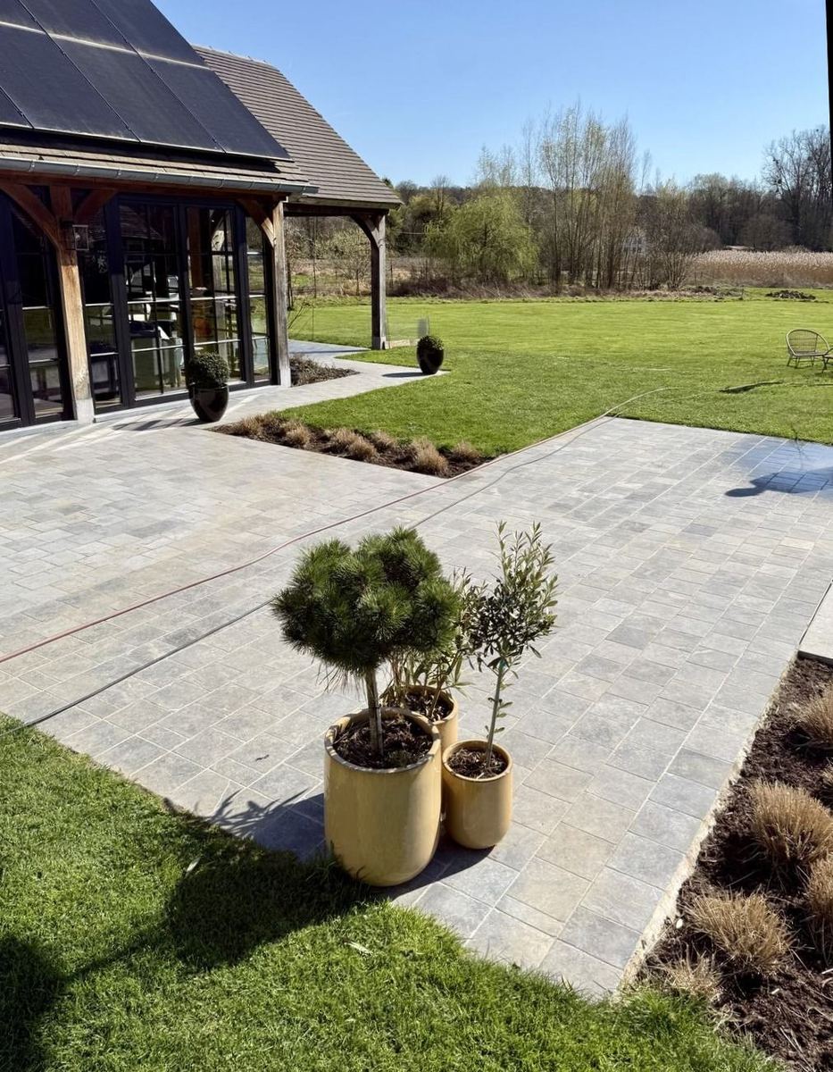 Large natural stone patio before cleaning